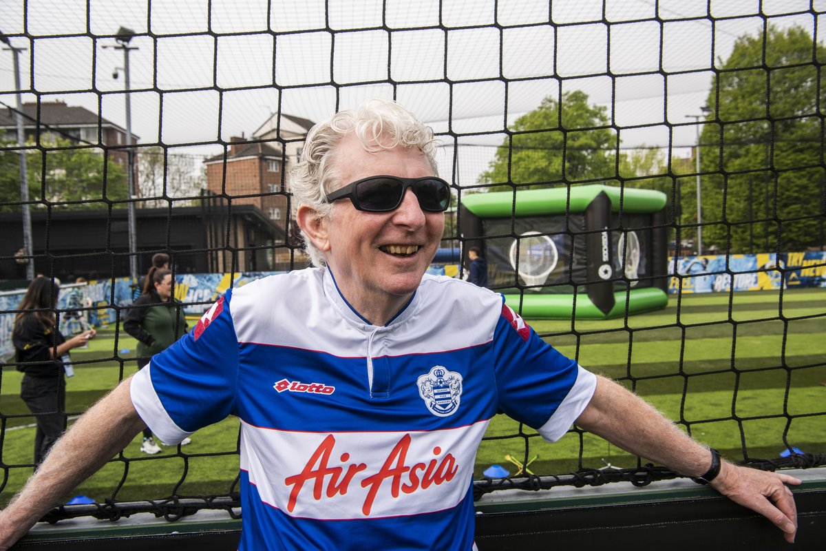 A QPR fan enjoys the action as Fair Shot FC visit the club