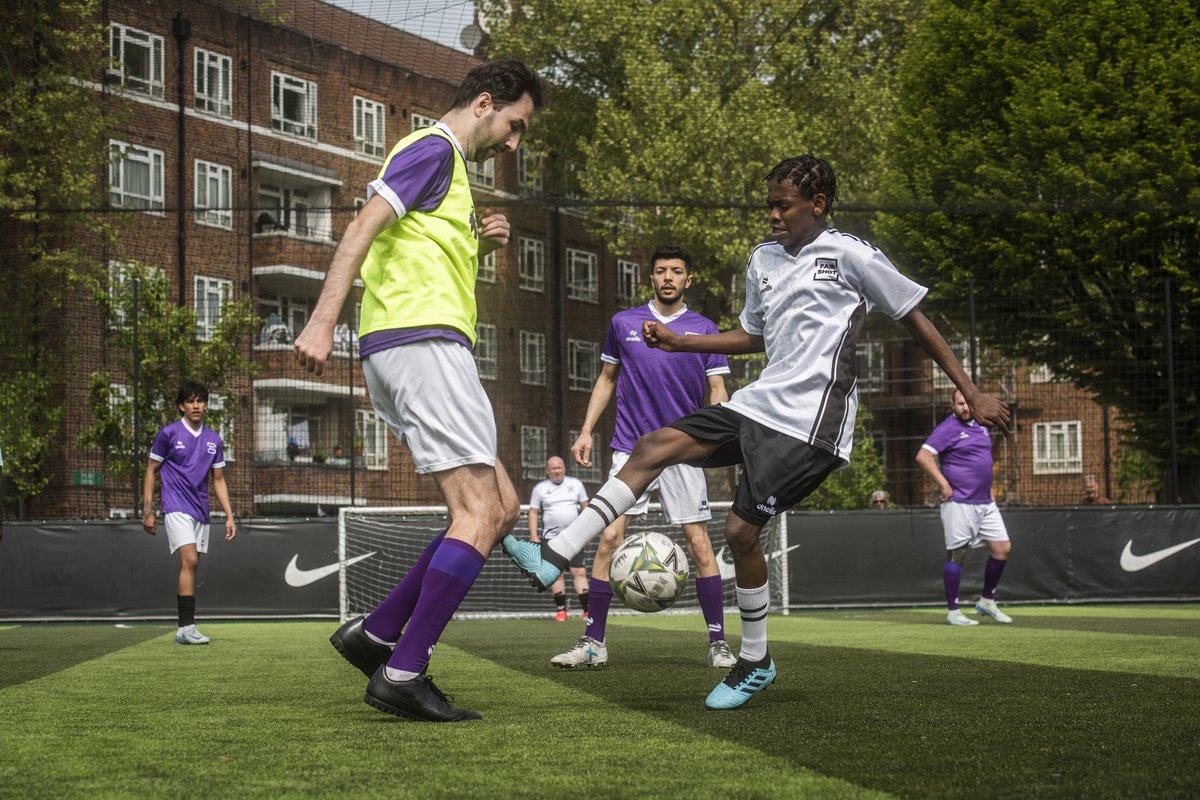 Two players compete for the ball during the 5-a-side match at QPR